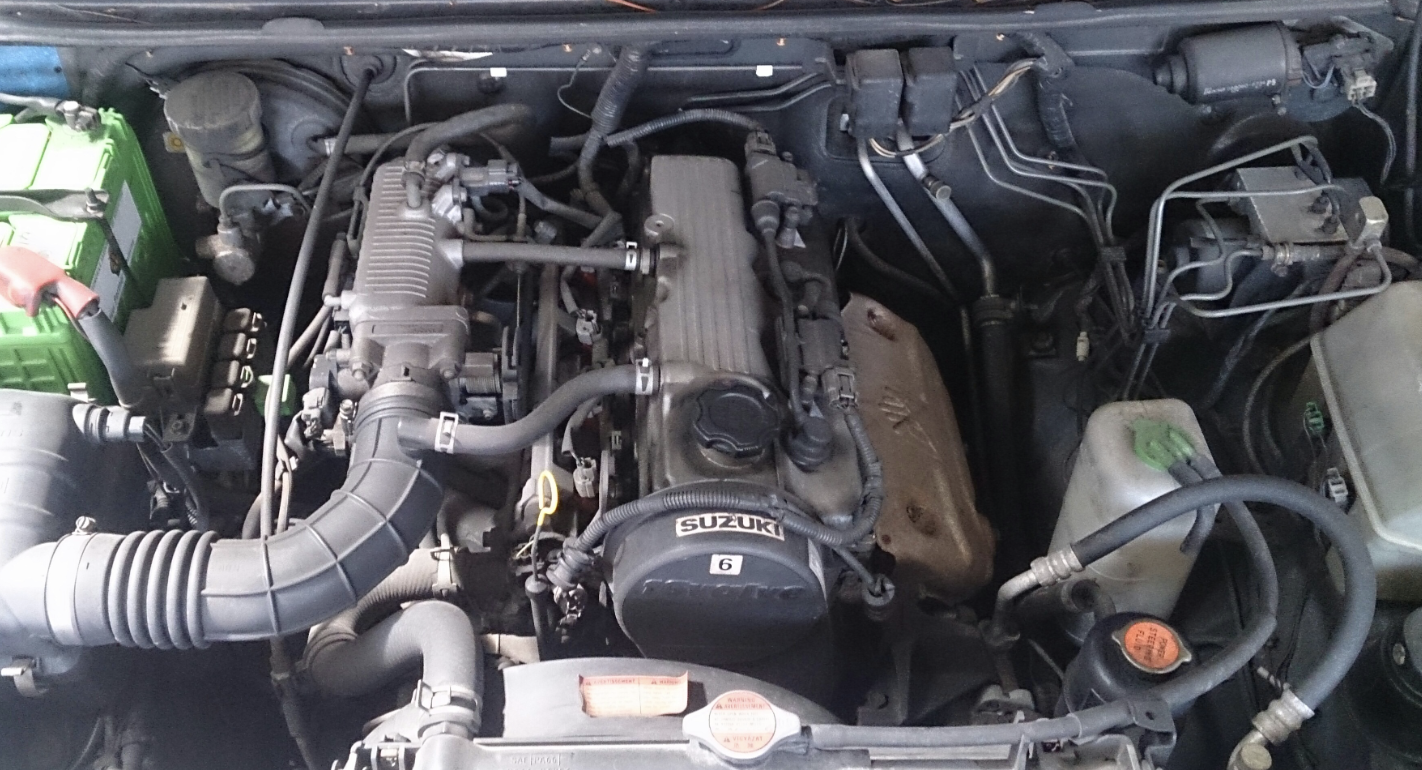 this image shows spark plugs and ignition coil in Cleveland, OH